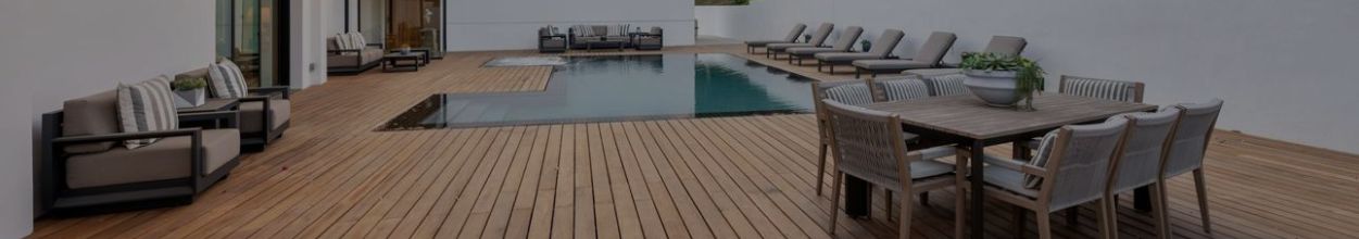 Luxury composite deck with pool, modern outdoor furniture, and custom backyard design in Ontario